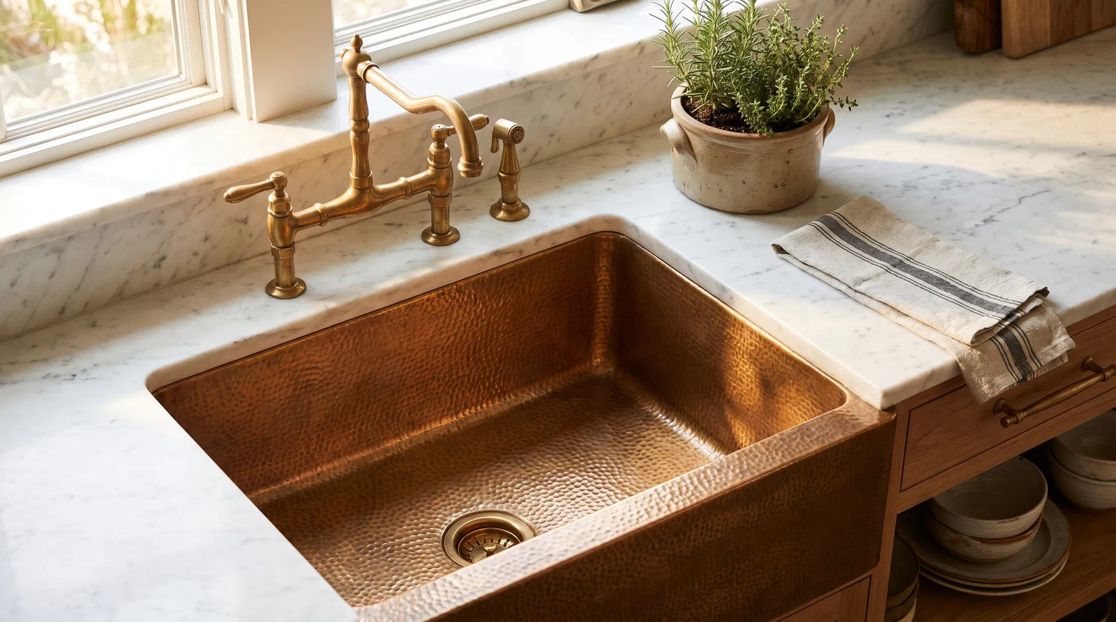Overhead view of a handcrafted hammered brass farmhouse sink