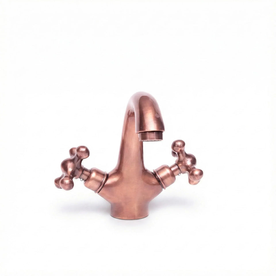 Antique copper vanity faucet – single hole cross handle, front view