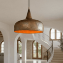 Aged copper dome pendant installed in kitchen – vintage ceiling fixture with warm glow – Brass For Homes