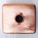 Hammered copper kitchen island sink – close-up of hand-hammered surface detail