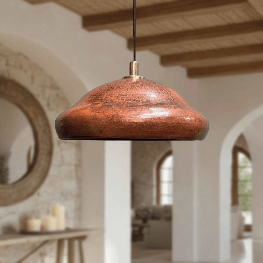 Copper rustic dome pendant light hanging over kitchen island – Brass For Homes