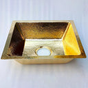 Hammered unlacquered brass kitchen sink – rear angle view showing depth