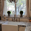 Oil rubbed bronze Victorian bridge faucet – side view showing dark finish