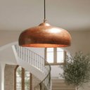 Solid dome copper pendant hung above dining table – Brass For Homes
