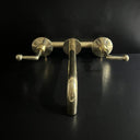 Unlacquered Brass Bathroom Faucet with Lever Handles wall mount faucet for wall-mounted sink layouts, bathrooms, kitchens, and compact wash spaces - view 1