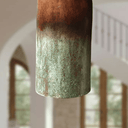 Verdigris copper cylinder pendants in a group above kitchen island — Brass For Homes