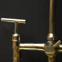 Unlacquered brass 3-hole bridge kitchen faucet with lever handles, side view – Brass For Homes