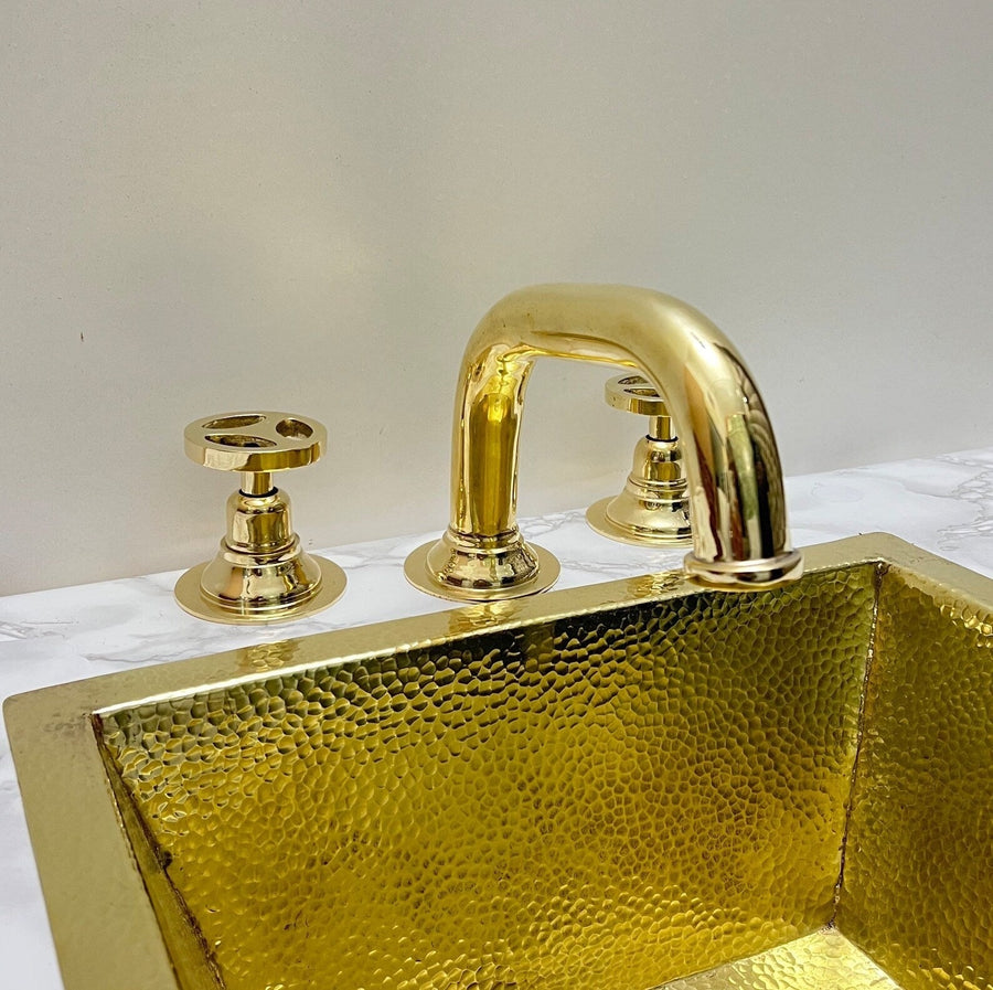 Unlacquered Brass Deck Mounted Faucet Wheel Handle bathroom faucet for bathroom vanities, powder rooms, basin sinks, and vintage-inspired wash spaces - view 1