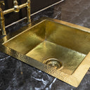 Hammered brass bar sink – installed in kitchen island countertop