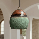 Mediterranean oval cutout verdigris copper pendant casting warm patterned light — Brass For Homes